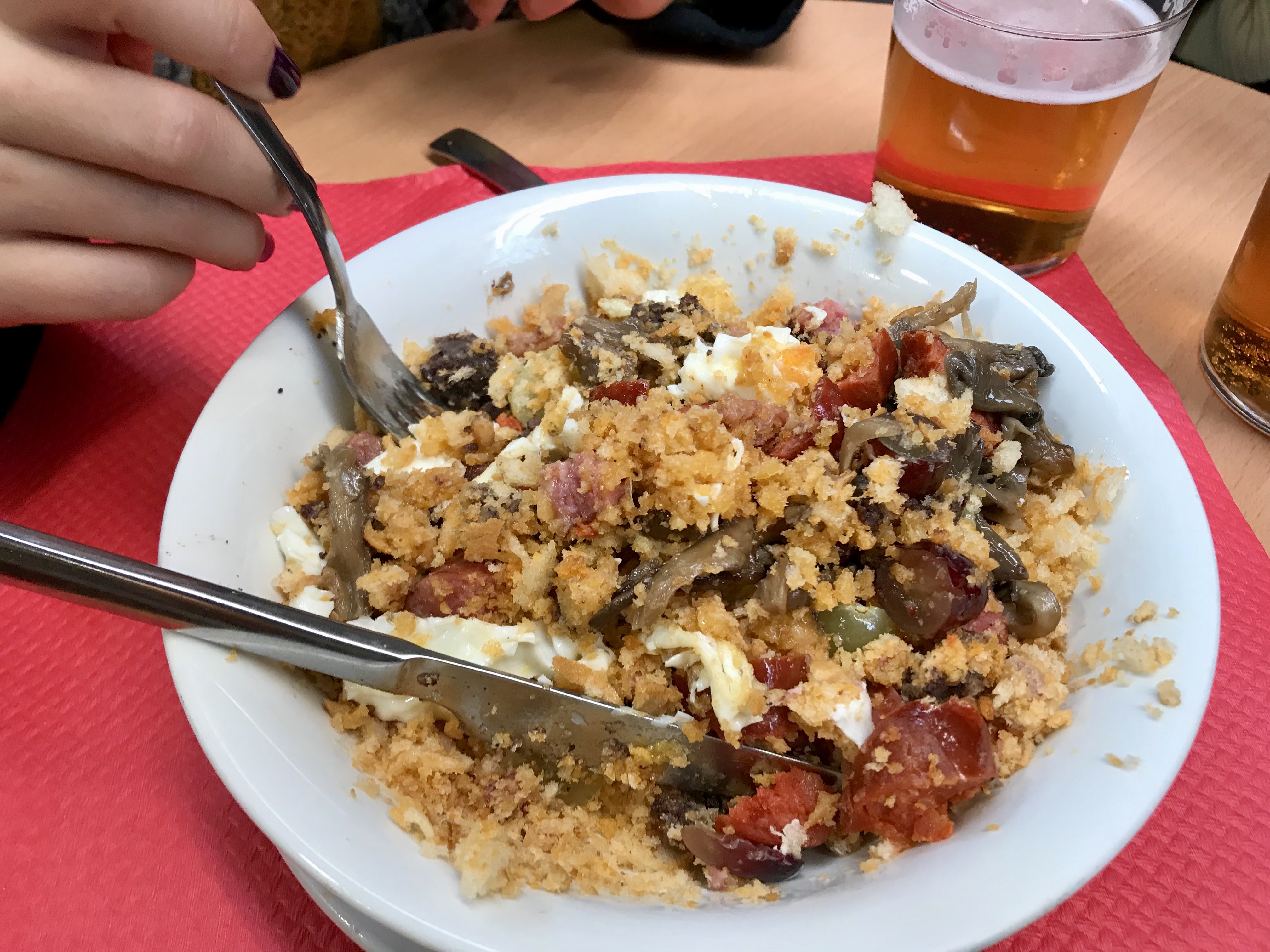The plate of "migas" after being mashed up